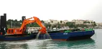 36 Meter Backhoe Dredger with 3 spud & flat top barge and tugboat